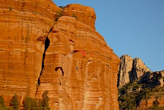 Paraglider And Red Rock